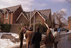 Tom Springer and Robert Holmes surveying lamposts